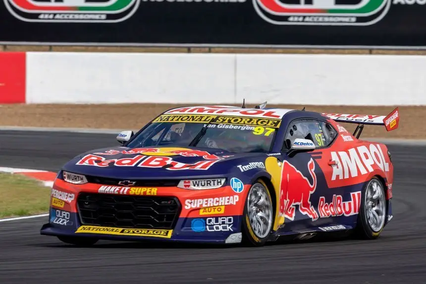 FIRING UP: The Red Bull 97 car screams around a corner in the final testing before the start of the season.