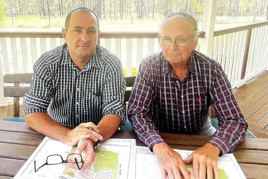 LONG WAIT: Local developer, Jason McDonald and Deebing Heights land owner, Brian Benson, discuss the future of the Deebing Downs project. Once the council approval comes through Jason will be able to sign off on the agreed land sale with Brian.
