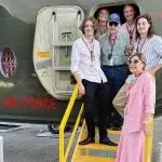 MEMORIES: Jeffrey Pedrina, centre, and his family members check out a de Havilland DHC-4 Caribou (A4-236) at RAAF Amberley Aviation Heritage Centre. Jeffrey flew the same type Caribou during the Vietnam War,