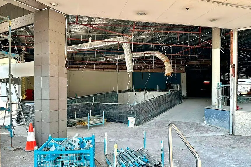 MAJOR REBUILD: Workers have been stripping out the old cinema building for months and now the costs have skyrocketed.