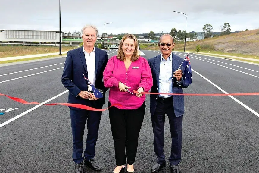IT’S OPEN: Mayor Harding with Springfield City Group’s Bob Sharpless and Maha Sinnathamby.