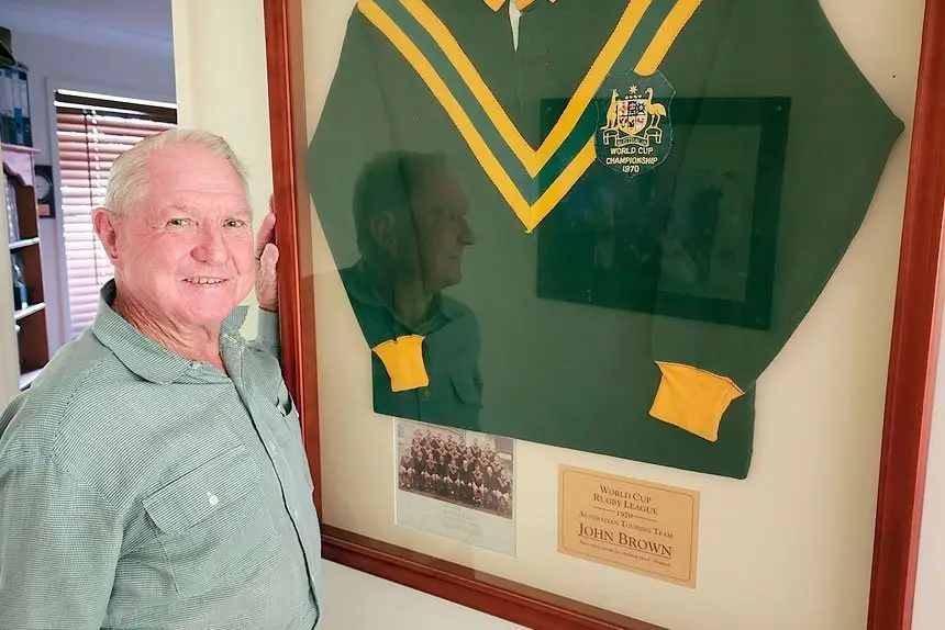 PROUD: Johnny Brown with his 1970 Australian World Cup jumper. He wore it when he played against France.