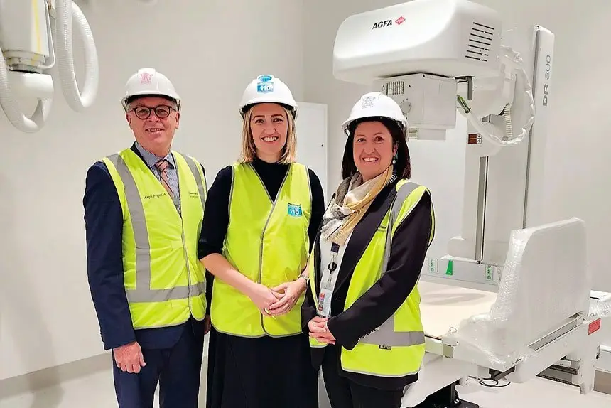 ON TRACK: West Moreton Health Chair, Michael Willis, Minister for Health, Shannon Fentiman and West Moreton Health CEO, Hannah Bloch, inspect the Ripley Satellite Hospital. x-ray room.