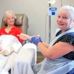 CARING: Pamela Hirst with cancer patient Valmai McDonald, 92, from Ipswich. Photo Peter Wallis