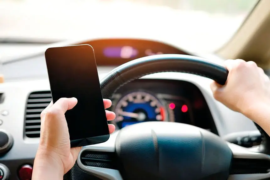 DON’T DO IT: Checking the phone when a message comes through is a habit young drivers must drop. Even a $1000 plus fine isn’t stopping them.