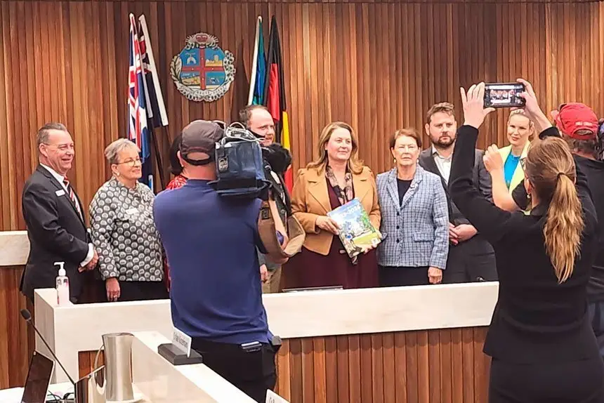 ALL SMILES: Councillors pose for the media after releasing the latest budget.