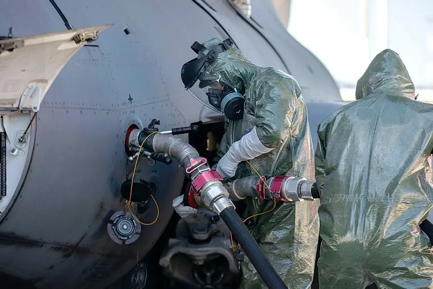 CAUTION: Personnel from 23SQN refuel a C-17A Globemaster III as part of Exercise Toxic Gauntlet at RAAF Base Amberley.