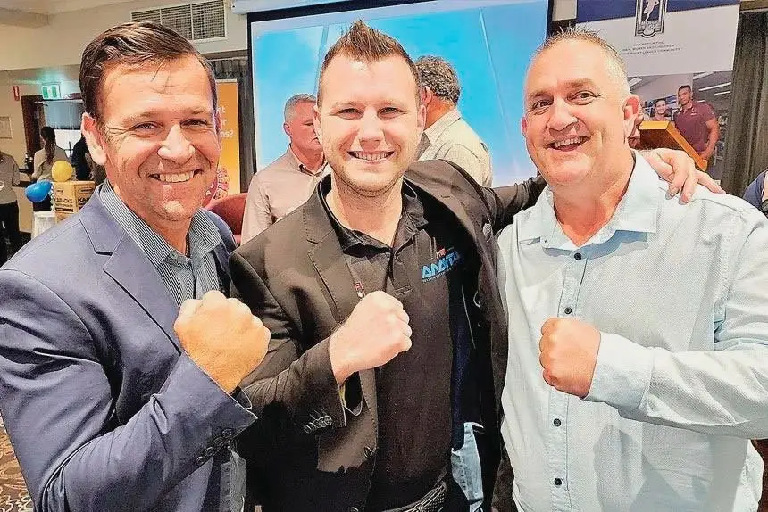 SUPPORTER Steve Mallet is a strong supporter of local charity groups he is pictured at a recent Men of League luncheon with boxer Geoff Horn