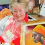 Vale - Judith Baker receiving an award in 2012.