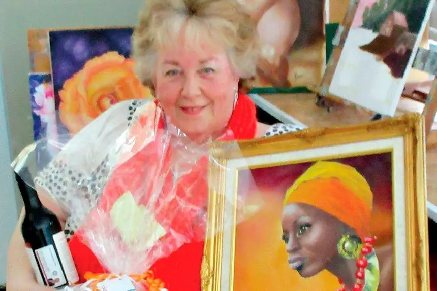 Vale - Judith Baker receiving an award in 2012.