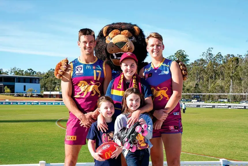 READY TO ROLL: Jarryd Lyons and Dakota Davidson grabbed a pair of roller-skates and posed with some young fans and the club mascot this week to promote the upcoming fun activity at their Brighton Homes Arena in Springfield.