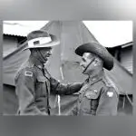 Lieutenant T.C. Derrick, (right) with Lt R. W. Saunders (left). Lt Saunders was the first Aboriginal commissioned in the Australian Army.