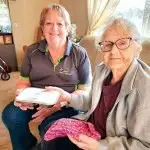 YOUR MEAL: Louise has worked in administration for MOW for 36 years, but still found time to deliver meals such as this one to 94-year-old Doris Hansen.