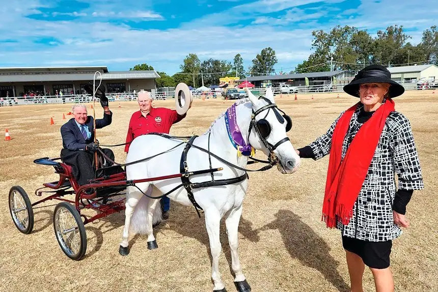 Graham Ross has been a regular entrant at the show for more than 60 years. He is joined by judge Pam Fisher and official Pat Lenihan.