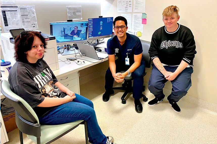 NEW SOUNDS: Daneka MacDonald with Audiology Assistant Yvan Miaco, QCH Audiologist Kate Browning (pictured on screen) and mum, Julie MacDonald