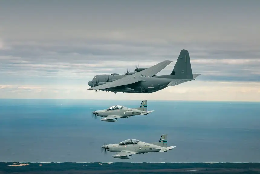 Two Royal Australian Air Force PC-21 aircraft, from No. 4 Squadron, conduct sorties over the Newcastle region with the United States Air Force AC-130J Ghostrider aircraft