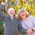 THANKS: Ukranian refugee Victor celebrates with his sister after eye surgery at Mater Hospital. Victor now lives at Goodna with Zoya and her family.