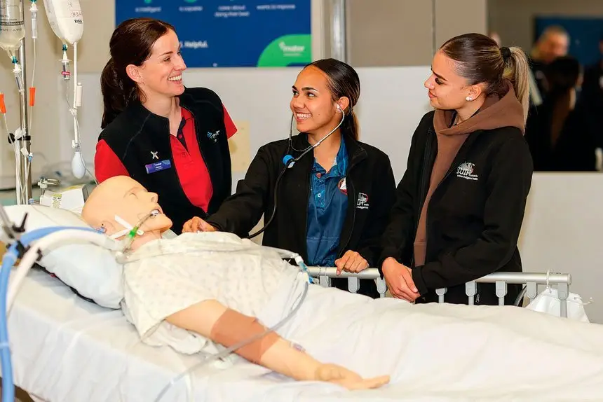 THE JOB: Mater physiotherapist Felicity Prebble with Trainees Cienna Fuller-Chapman and Laylarni Fraser. Photo Peter Wallis