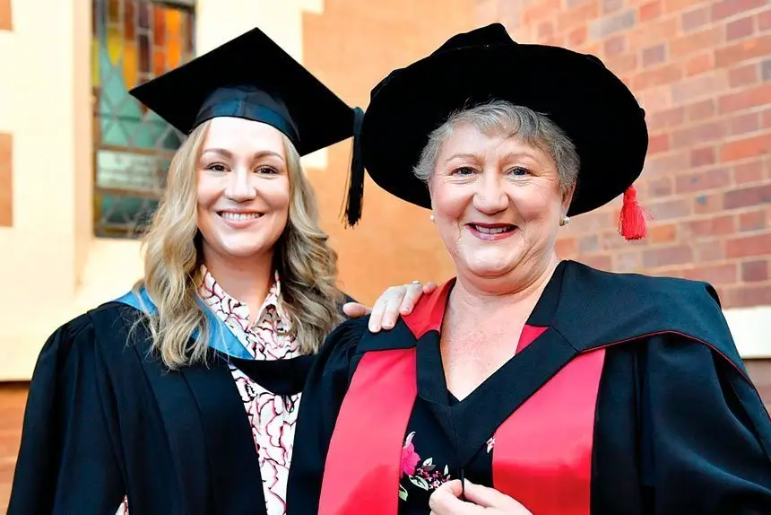 TOGETHER: Barbara Black (right) supporting her daughter Elizabeth who graduated with a Bachelor of Nursing last week. The roles were reversed when Barbara graduated with a Doctor of Philosophy later that same day.