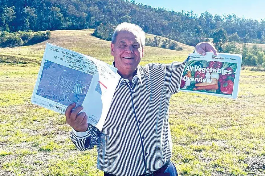 LET’S GO: Colin Dorber holds the massive Lockyer Valley Foods project’s official council approval to start earthworks.