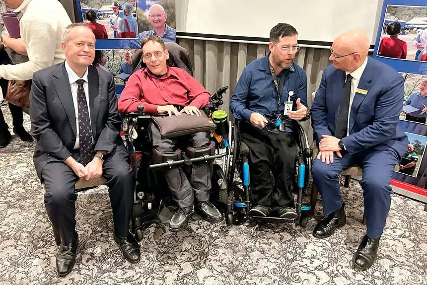 LISTENING: Bill Shorten and Shayne Neumann getting the real story from some of those who attended the NDIS forum in Ipswich.