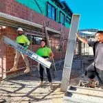 PLENTY OF WORK: Tradies were kept busy building 2258 new homes in Ipswich in the last financial year. Scaffolders like Junior Sami, Kedz Blue and Shayden White have been in high demand. They were on site at Spring Mountain last week.