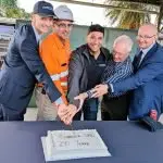 POWERFUL YEARS: CleanCo CEO, Tom Metcalfe, Swanbank Maintainer Operator, Eric Blashak, Lance McCallum, former Swanbank employee, John Scott, and Federal Blair MP, Shayne Neumann, cut the cake to recognise a Swanbank milestone.