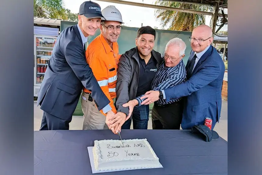 POWERFUL YEARS: CleanCo CEO, Tom Metcalfe, Swanbank Maintainer Operator, Eric Blashak, Lance McCallum, former Swanbank employee, John Scott, and Federal Blair MP, Shayne Neumann, cut the cake to recognise a Swanbank milestone.