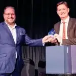 AWARD: UniSQ’s Prof. Jim Nyland receiving the award on behalf of his team. Photo: Louis Trerise, AFR