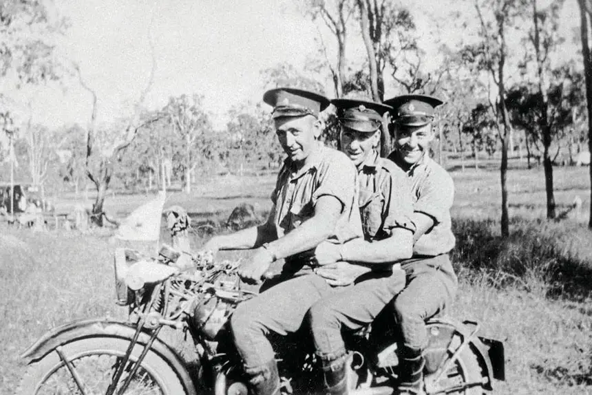 CATCHING A RIDE: Jack Thomas, Gordon Sutherland and George Wratten at Lowood, 1940. PHOTO: Picture Ipswich