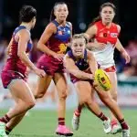 IN CONTROL: Belle Dawes hands off the ball with Jade Ellenger and Ally Anderson giving support.