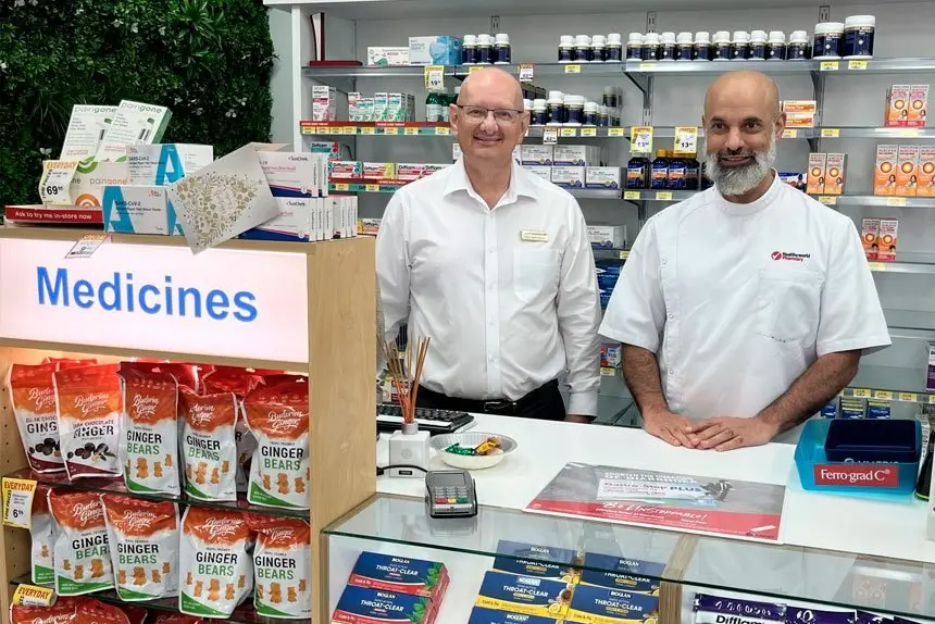 PRICE DROP Shayne Neumann with Healthy World Pharmacy’s Moegamat Gafoor.