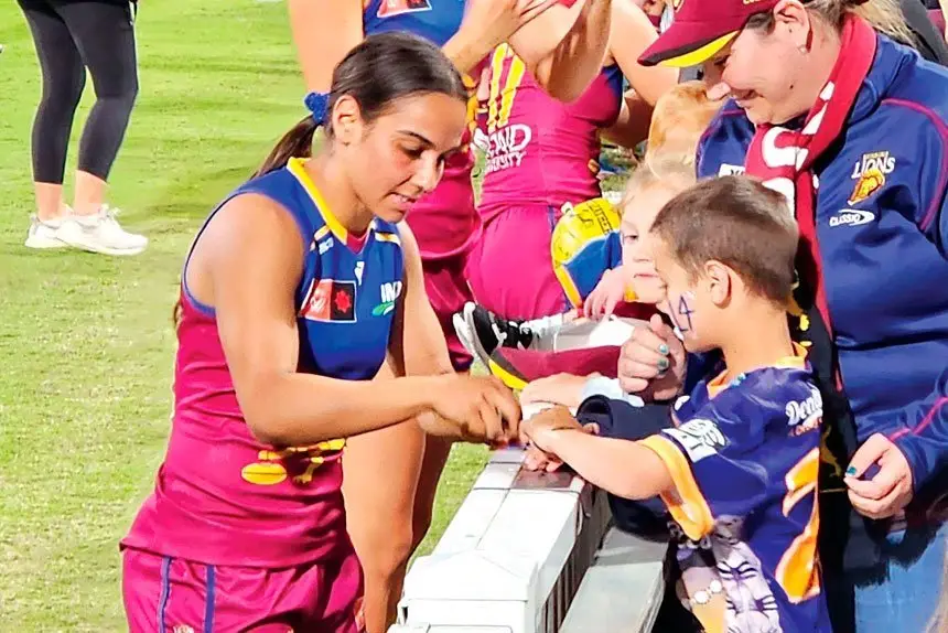 BIG CROWD: The Lions show their appreciation to the big crowd that turned up on Saturday night.