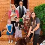 BLESS YOU: Rev Lorraine Lynch with some of the special guests for her Sunday service.
