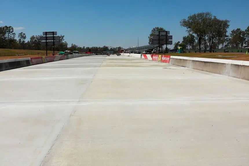 CONCRETE BY THE TRUCKLOAD: Thousands of square metres of concrete have been poured to prepare the new drag racing surface.