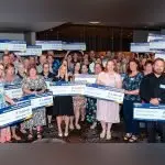 A HELPING HAND: Representatives of more than 35 community groups gathered at the Brothers Leagues Club last week to received grant awards.