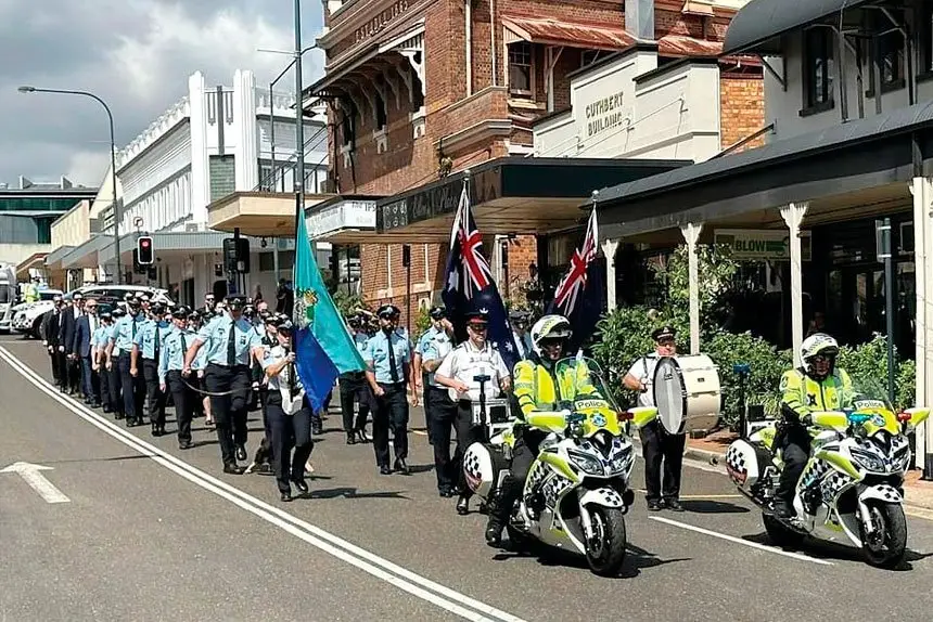 Local police march in honour of their comrades who died in the line of duty.
