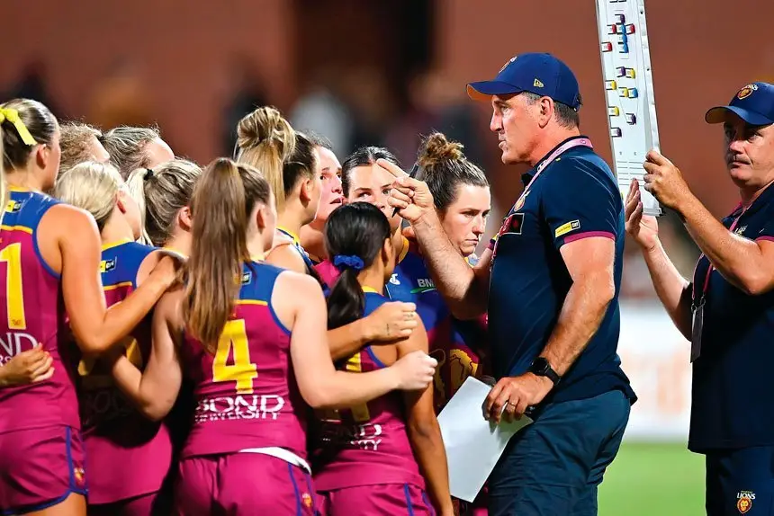MAKING A POINT: Lions head coach Craig Starcevich tells his players what they need to do. Despite the lecture the Lions fell to the Collingwood Magpies. (Photo by Albert Perez/Getty Images via AFL Photos)