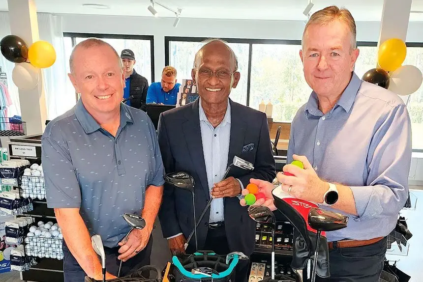 NEW GOLF SHOP: Maha Sinnathamby (centre) with Brookwater Professional, Dwayne Kirwin and GM Patrick Young.