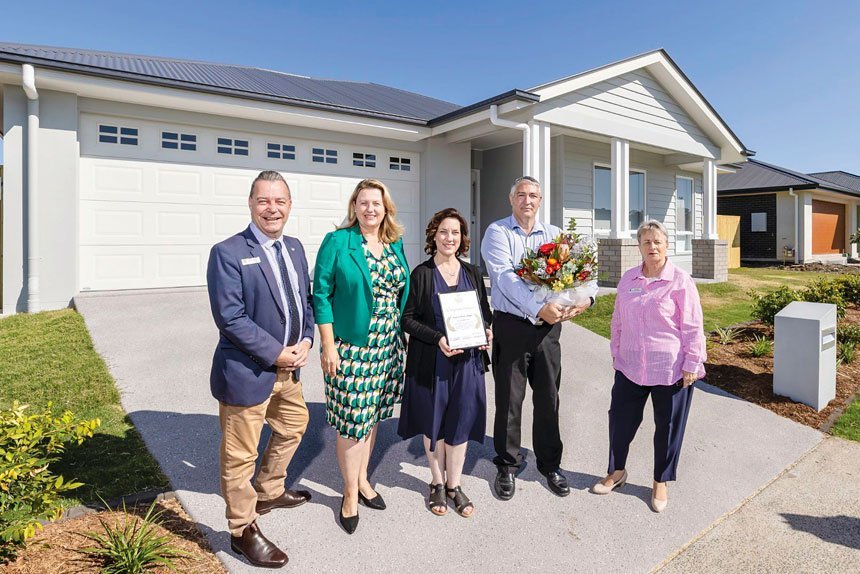 WELCOME: Mayor Teresa Harding and Councillors Russell Milligan and Kate Kunzelmann welcome the Riddell family to Ipswich.