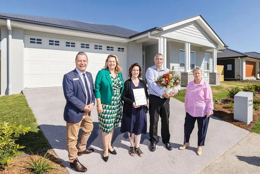 WELCOME: Mayor Teresa Harding and Councillors Russell Milligan and Kate Kunzelmann welcome the Riddell family to Ipswich.