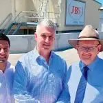 WELL DONE: Local MP’s Lance McCallum and Shayne Neumann say well done to JBS CEO, Brent Eastwood, after he asked for locals to apply for 500 new jobs at the plant.