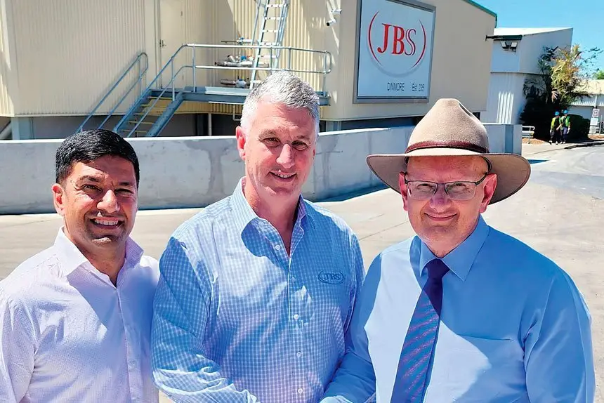 WELL DONE: Local MP’s Lance McCallum and Shayne Neumann say well done to JBS CEO, Brent Eastwood, after he asked for locals to apply for 500 new jobs at the plant.