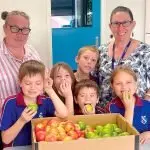 CRUNCH CREW: Parent volunteer Jen Errock, teacher aide Ann McGreevy and munchkins Ivan, Micah, Sylar, Matilda and Lilith.