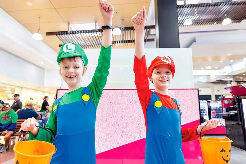Dylan and Kobe Harvey get set for treats in the guise of Luigi and Mario.