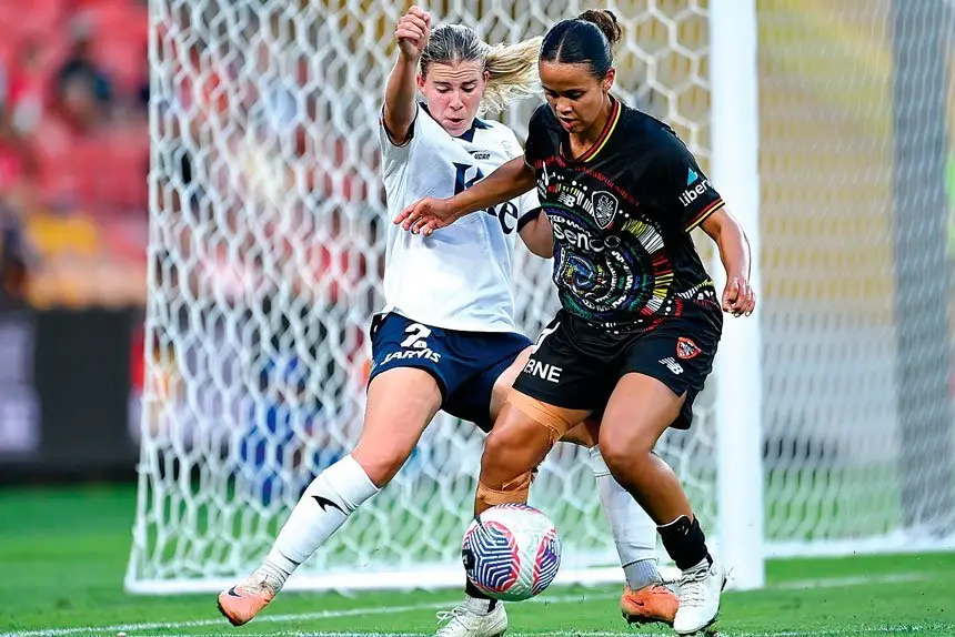 Ipswich’s own Holly McQueen fights for the ball on Sunday.