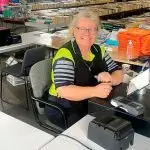 Doris Brown, hard at work taking buyers’ money