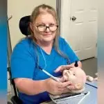 Minnie Robinson has not allowed quadriplegia to stop her.