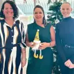 The crew at Ray White Rosewood are ready for donations. Left to right: Michala Robinson, Megan Acutt and Georgia Greet.