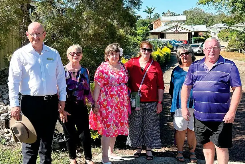 Shayne Neumann with former Mi Hi Grove residents.